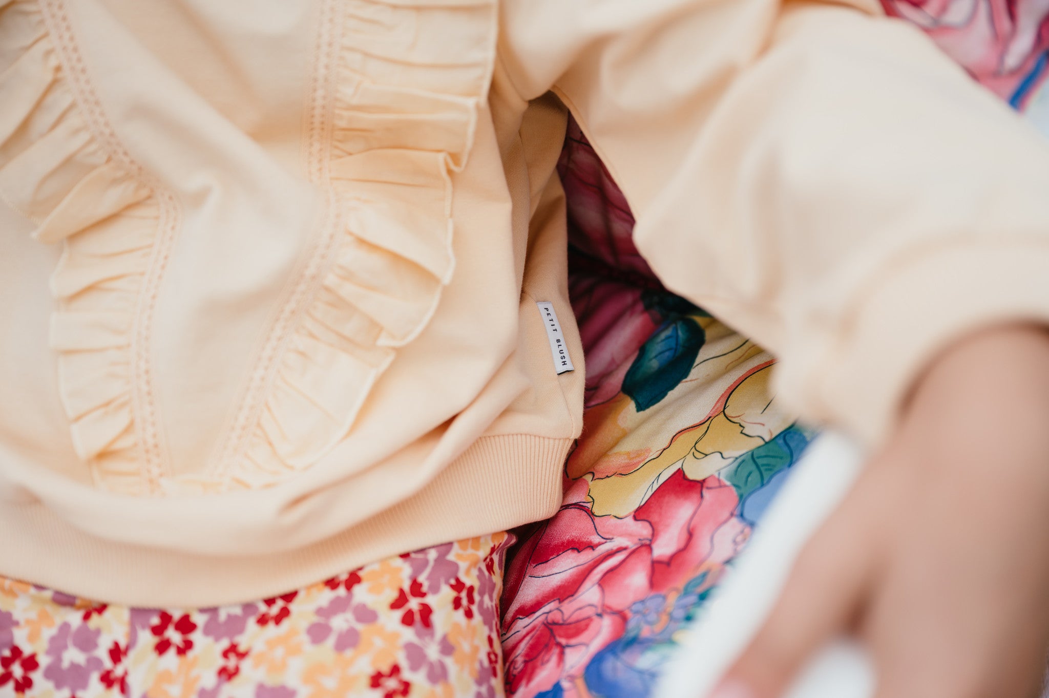 Rüschenpullover | Aprikosensorbet